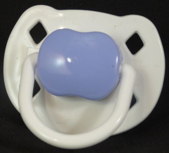White & purple Spanish style dummy with Nuk teat