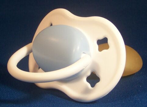 white & blue dummy with Nuk teat