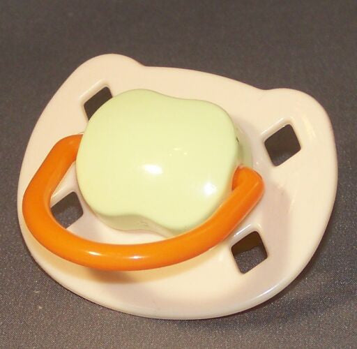 Cream, Light-green and orange Spanish style dummy with Nuk teat
