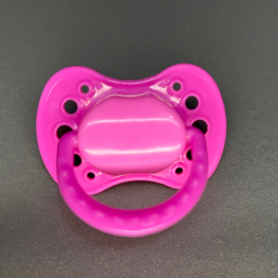 pink dummy with Nuk teat
